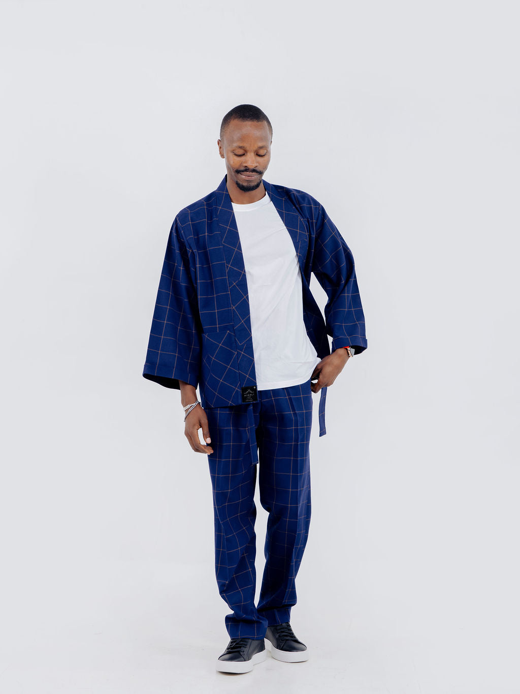 Men's custom kaftan featuring premium fabric and refined tailoring
