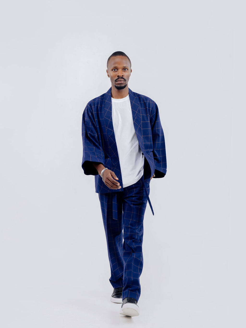 Men's custom kaftan featuring premium fabric and refined tailoring